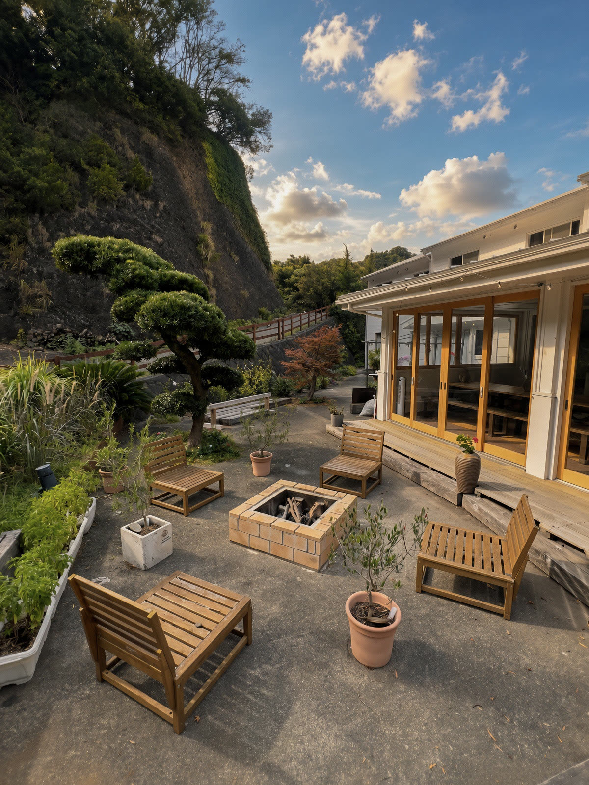 Garden courtyard, firepit and wooden chairs
