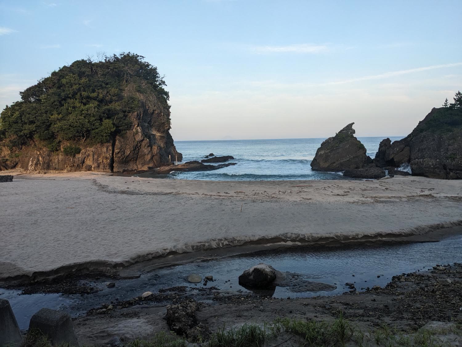 Sand, rocks, and the creek at the beach