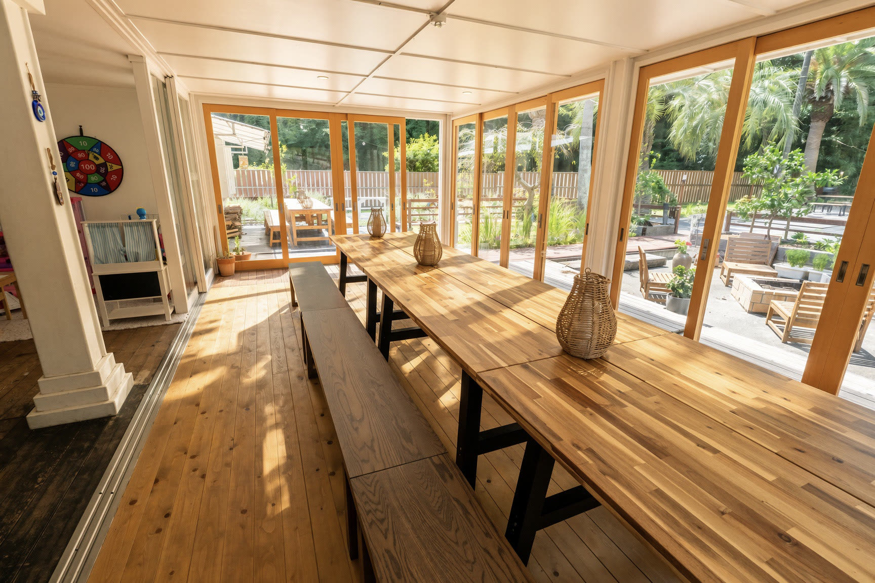 The long table and folding glass onto the garden